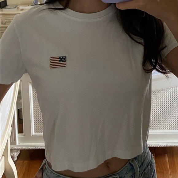 It is a white shirt from Brandy Melville. - Picture 3 of 3